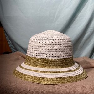 Never worn pollywood white and gold sun hat